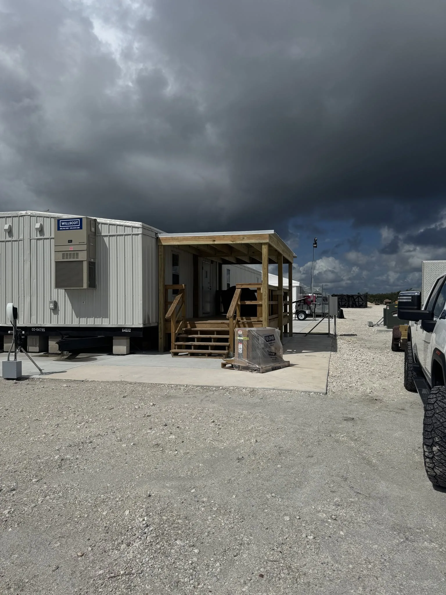 Overview of an active RSC construction site with equipment and trailers being coordinated.