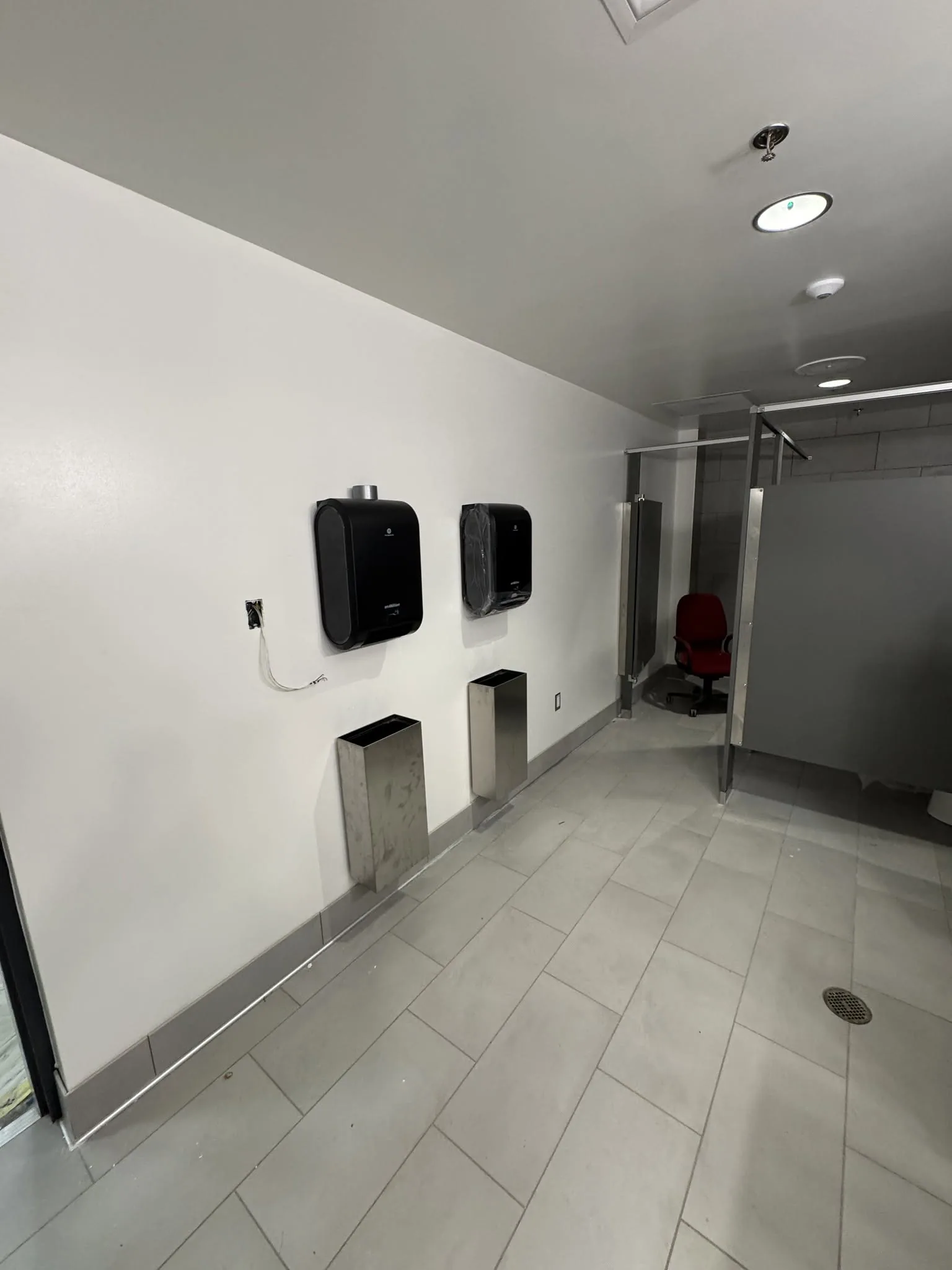 Finished open-plan interior space in a commercial building.