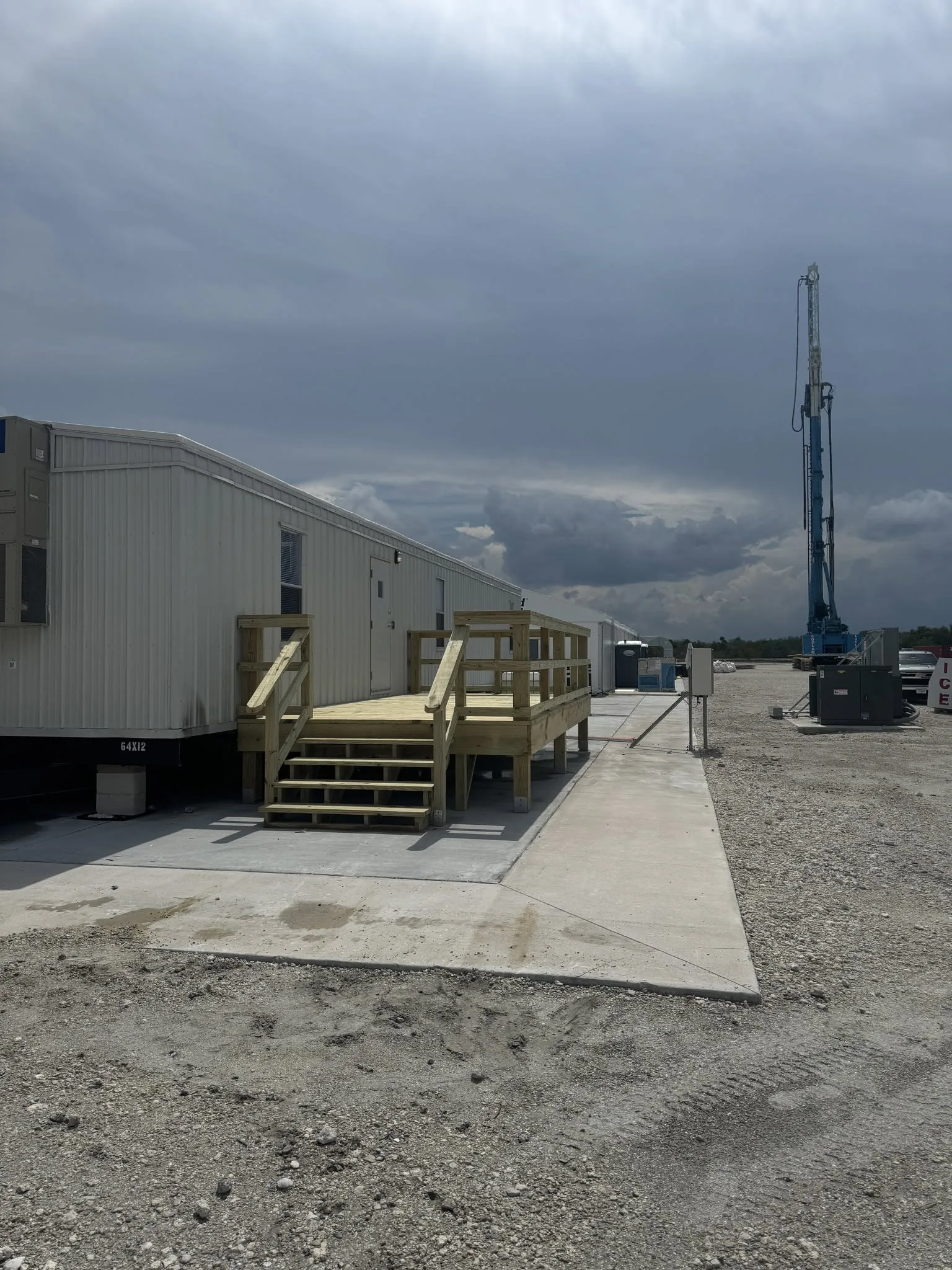 Wide view of an active RSC construction site with equipment across Brevard County.