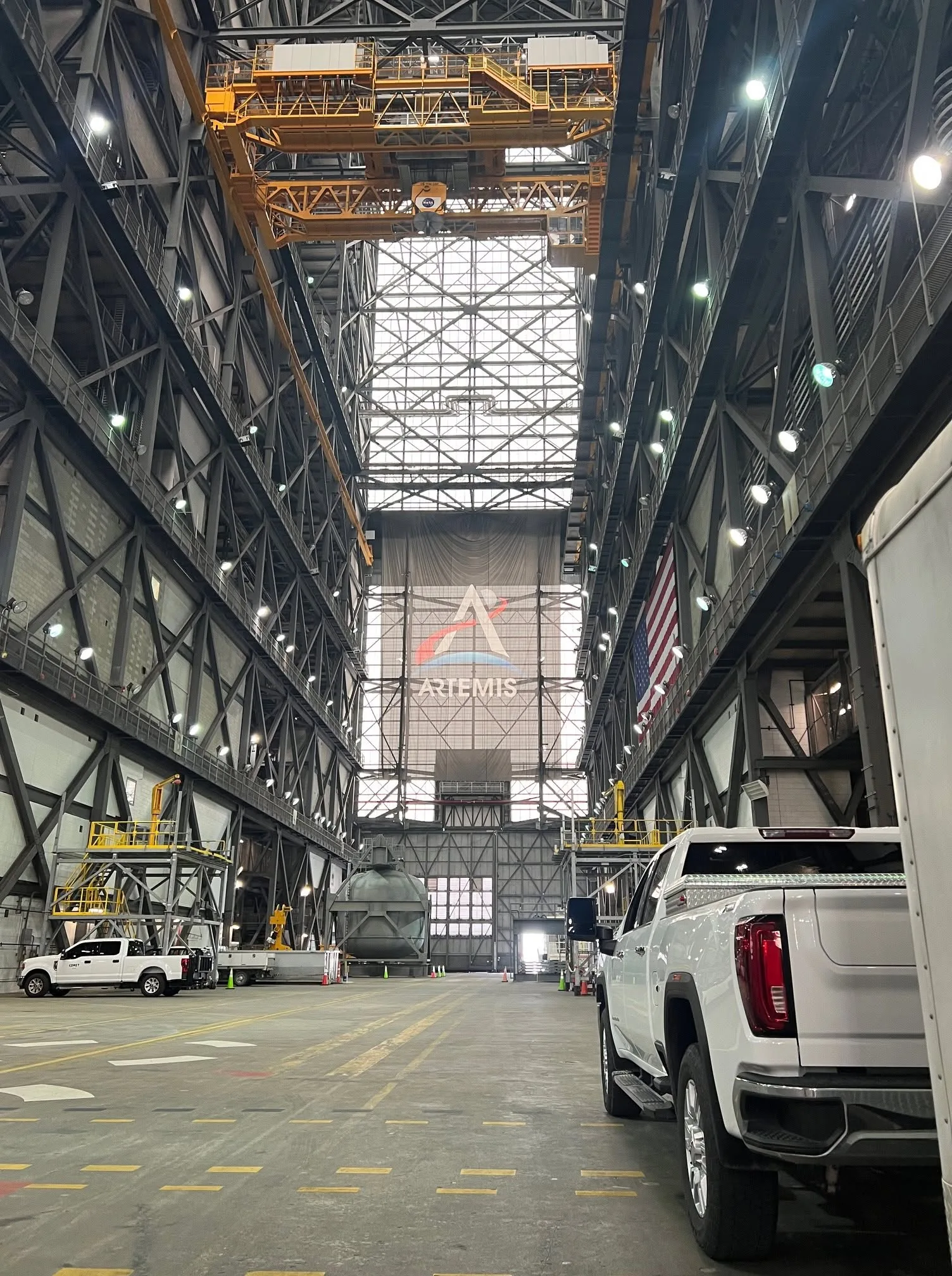 Wide interior view of a large steel-framed commercial building.