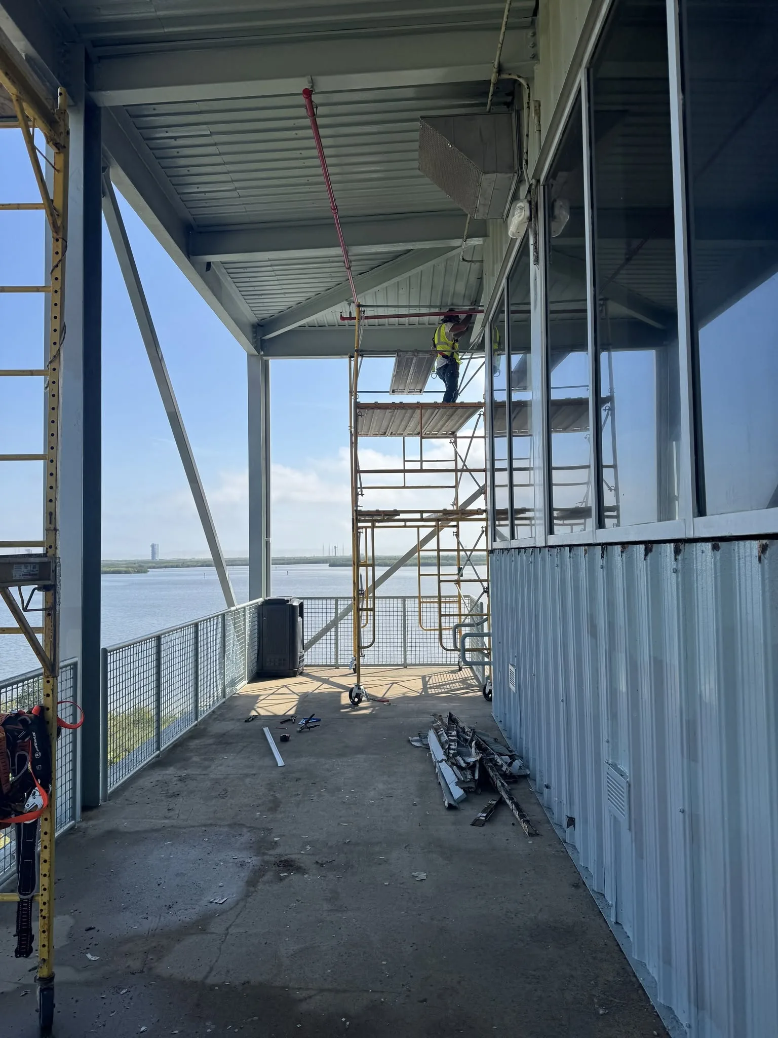 Exterior structural steel framing of a commercial building under construction.